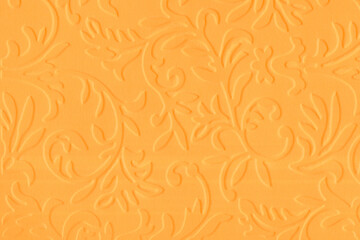 embossed orange textured background. embossed orange backdrop.