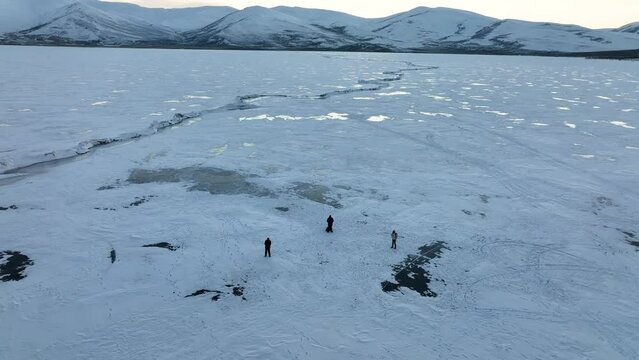 People in the Frozen Cildir Lake and Carriage Drone Video, Cildir Ardahan, Turkey