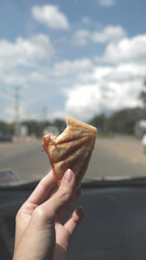 person holding a sandwich