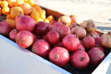 Pomegranate garnet fruit background pattern. Close up.