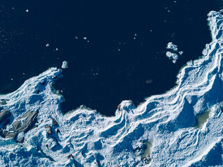 Aerial view of lake or sea ice formations in Finland. Cracked Ice from drone view. © NBLX
