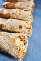 Burito roll wraps on blue