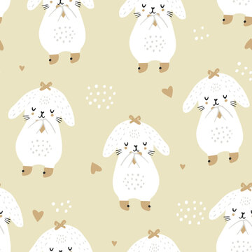 Seamless childish pattern with cute baby rabbits and hearts. Creative kids texture for fabric, wrapping, textile, wallpaper, apparel. Vector illustration © solodkayamari