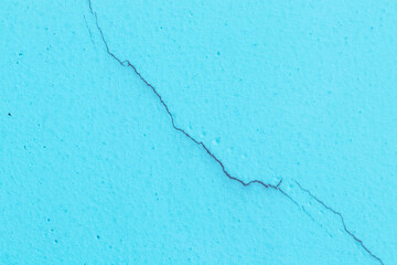 Dark blue colour Texture background concrete wall has cracks texture abstract. Make wallpaper along the walls of houses, building. Used all over world. Damaged from non-standard building structure
