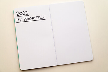 Notebook page with text "2023 Priorities". New year expectations, goals and priorities. 
