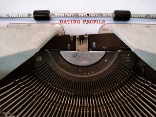 Vintage typewriter with typed text DATING PROFILE - writing to describe  in dating sites to grab attention and spark conversations with potential match