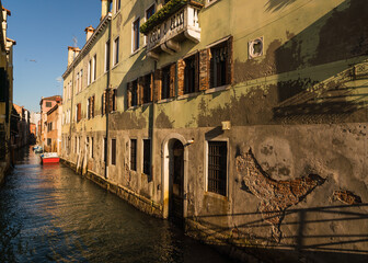 architectural detail of buildings along a canal in Venice, Italy 