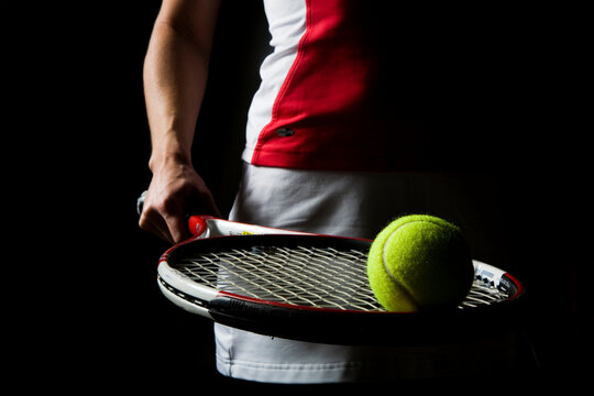 A tennis player poses for action portraits in Carlsbad, CA.
