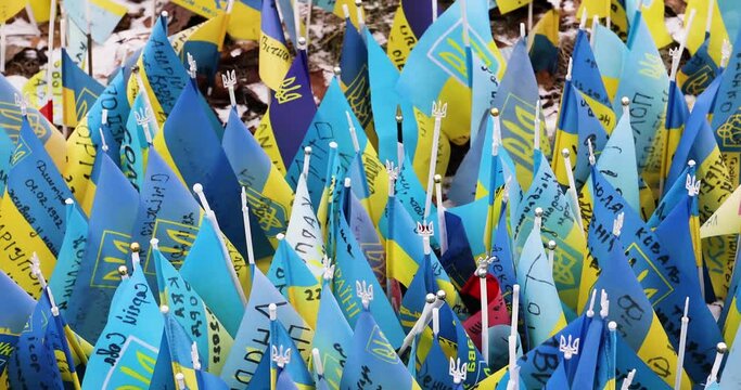 background from the flags of Ukarina in memory of those who died defending their land and children. War in Ukraine