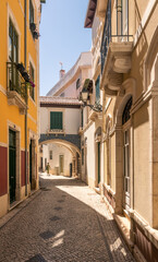 Fototapeta premium Beautiful street view of the historic center of the city of Leiria in Portugal, with Casa do Arco in the background.