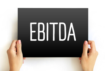 EBITDA - Earnings Before Interest, Taxes, Depreciation and Amortization acronym text on card, concept background