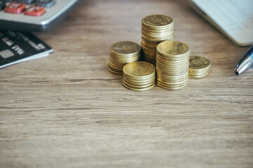 Stack of money coin on office desk. Business and financial concept. 