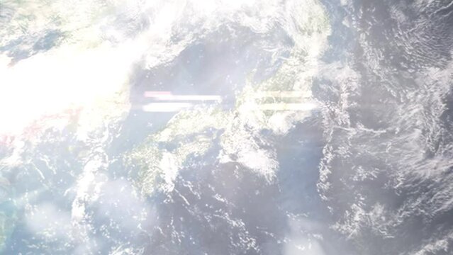Earth zoom in from outer space to city. Zooming on Moriguchi, Osaka, Japan. The animation continues by zoom out through clouds and atmosphere into space. Images from NASA
