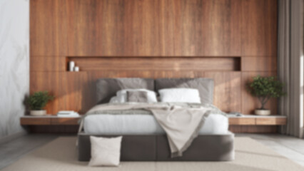Fototapeta na wymiar Blurred background, modern bedroom with wooden headboard. Velvet bed, bedding, pillows and carpet. Contemporary interior design