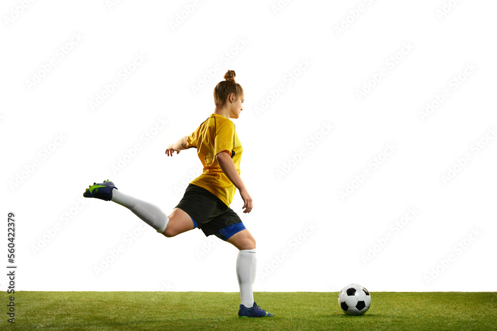 Sticker Winning goal. Young professional female football player in motion, training, playing football, soccer isolated over white background