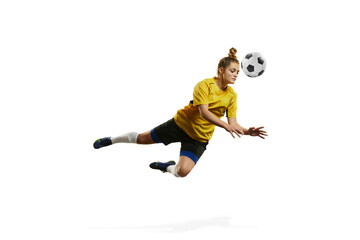 Hitting ball with head. Young woman, professional female football, soccer player in motion, training, playing isolated over white background