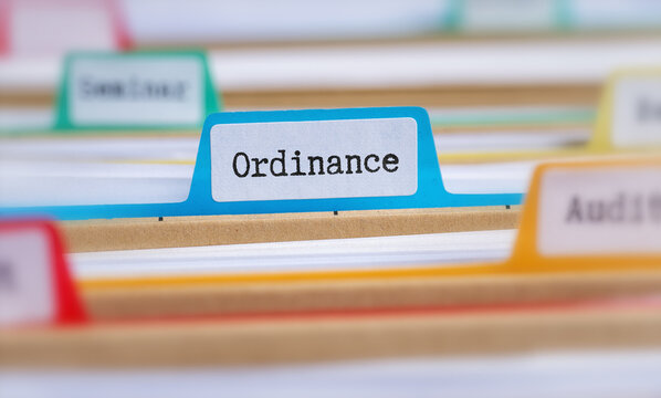 File folders with a tab labeled Ordinance