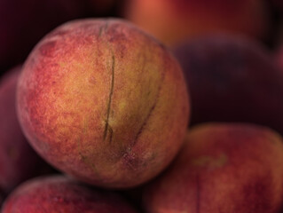 Ripe peach display at a local Farmer's Market, Lakeland, Florida
