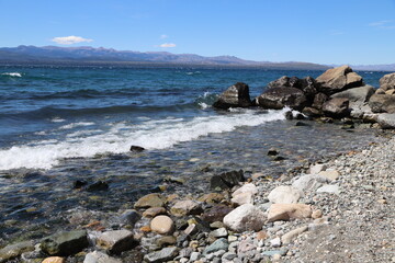 Panoramic view of Lake Nahuel Huapi on the shores of the city of Bariloche, Río Negro, Argentina. Argentine Patagonia. Patagonian lake. Touristic city. Puerto San Carlos.
