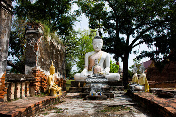 Ancient antique buddha statue and ruins old building for thai people travel visit and respect praying blessing wish holy mystery worship in Wat Phra Si Rattana Mahathat temple in Suphan Buri, Thailand