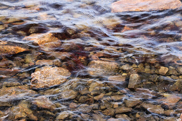Stones under clear water