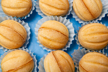colorful macaroons on a wooden table