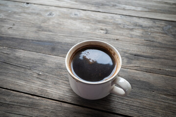 black coffee on a wooden table