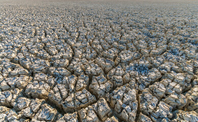 Close up of the cracked bone dry soil in the Etosha salt pan, Namibia