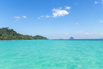 Crystal clear water and a very interesting snorkeling reef, that is swimmable from the beach at Koh Kradan in Trang, Thailand. 