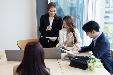 Business partnership meeting, Colleagues meeting to discuss project planning and market research for business profit growth. Collaboration of people in the organization.