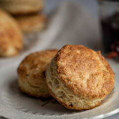 Freshly baked scones with cranberry-cherry preserves