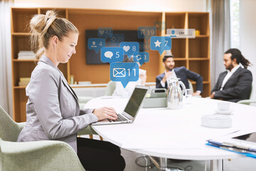 Businesswoman works on the computer with notifications
