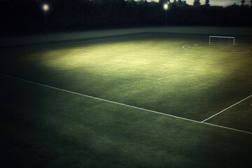 Fototapeta na wymiar textured free soccer field in the evening light center, midfield with the soccer ball. Generative AI