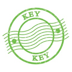 KEY, text written on green  postal stamp.