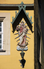 Mondsichelmadonna / Woman of the apocalypse figure with gothic baldachin in the old town of Kitzingen, Gemany © float