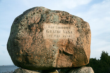 stone cross on the rocks