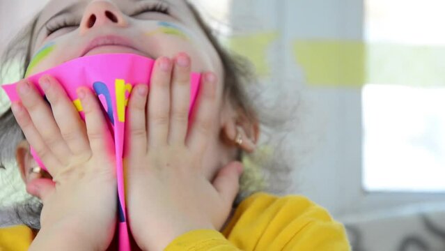 A child in tears because of the war. War in Ukraine. Children against war. Peace concept. Cold winter in Ukraine. Rocket strikes on Ukrainian cities. Stop war. Russian aggression in Ukraine
