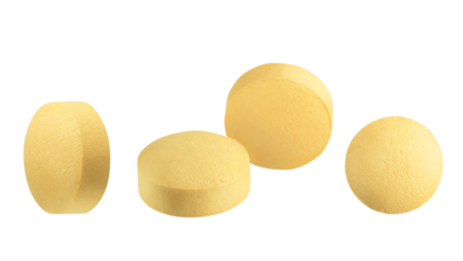 Set of yellow round pills isolated on white or transparent background.