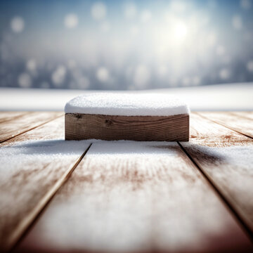 Decorative winter background with bokeh lights, snowflakes and empty wooden table.