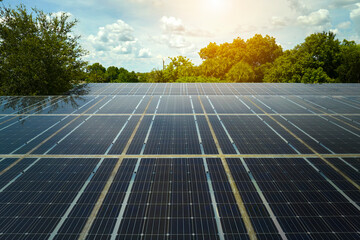 Solar panels installed over parking lot for parked cars for effective generation of clean energy