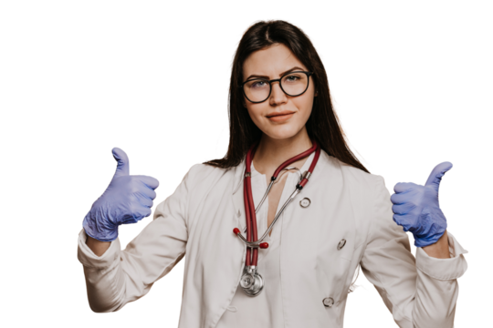 Female doctor in glasses, phonendoscope on neck dressed in a medical gown, shows thumb up gesture, over transparent background, studying virus, discover vaccine. Covid-19 virus concept. Medicine