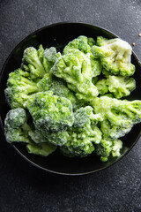 frozen broccoli quick freezing vegetable fresh healthy meal food snack on the table copy space food background rustic top view keto or paleo diet