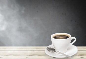 Tasty hot coffee in cup on the table
