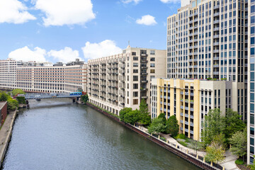 Obraz premium Exterior Image of the Chicago Riverwalk. Aerial Photo of the Chicago River in the Summer. Midwest summer along the river.