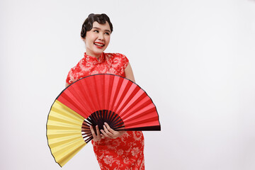 Smiling young beautiful asian woman in traditional dress on isolated white background.