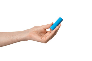 Rechargeable 18650 or 21700 battery in a male hand, isolate.