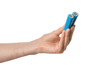 Rechargeable 18650 or 21700 batteries in a male hand, isolate.