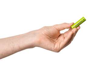 Rechargeable battery in a male hand, isolate.