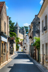 Street in the Beautiful Village of Montresor, with the Facade of Montresor Castle, Loire, France