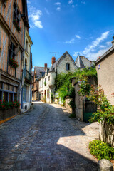 Fototapeta na wymiar Charming, Cobbled Street in the Famous Historic Town of Chinon in the Loire Valley, France